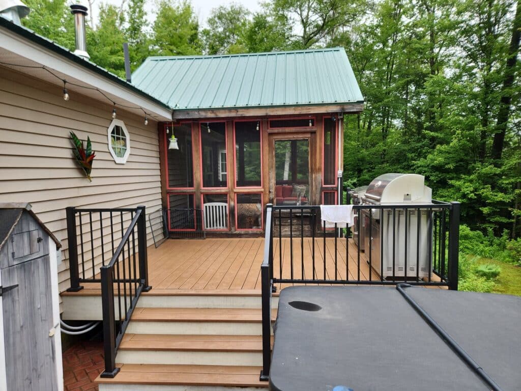 Modern wood deck with built-in seating and planters – backyard deck ideas